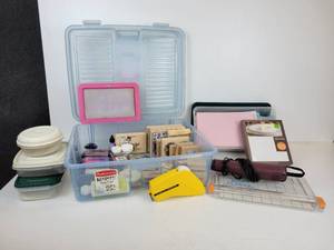 lot 153 image: Lot of Stamping Supplies and Accessories, Ink Pads, Stamp Scrubber, Paper Stock, Glitter, and More