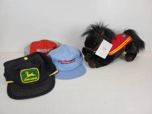 lot 167 image: Lot of (3) Vintage Baseball Caps - John Deere, Cushman Motor Scooters, and Conklin - Mike Stuffed Wells-Fargo Promo Stuffed Animal
