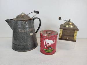 lot 193 image: Enamelware Coffee Pot, Tobacco Tin, and Coffee Grinder