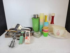 lot 243 image: Lot of Vintage Kitchen Tools, Cups, and Containers - Includes Tupperware and Melmac