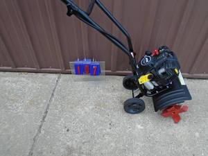 4 QL 4 cycle mini tiller. Looks brand new. Tested & works. As shown.