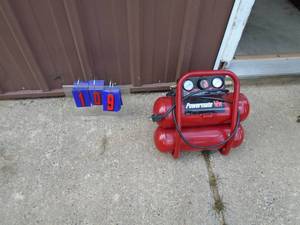 Power Mate mini air compressor. As shown.