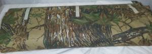 lot 143 image: Camouflage flannel by Real tree.