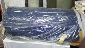 lot 234 image: Polyester Quilted Padded Lining Fabric.