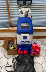 lot 95 image: Rug Doctor Carpet Cleaner with Cleaning Solution and Accessories 