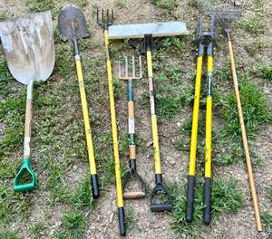 lot 143 image: Lawn and Gardening Tools- Hole Digger, Rakes, Shovels and More -Many Professional Grade