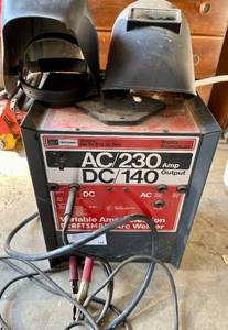 lot 168 image: Craftsman AC230 DC140 Variable Amp Arc Welder with Welding Helmets