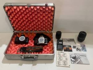 lot 4 image: Two Nikon N65 Cameras With Hard Case, Lenses And More