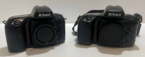 lot 7 image: Two Nikon N70 Af SLR Film Camera Bodys (No Lens) 1 Slightly Sticky On Back Rubber