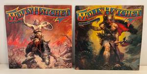 lot 102 image: 1979-1980 Molly Hatchet LPs (Beatin The Odds) Semi Gloss Cover WInsert Great Condition And Molly Hatchet (Flirtin With Disaster) WInsert
