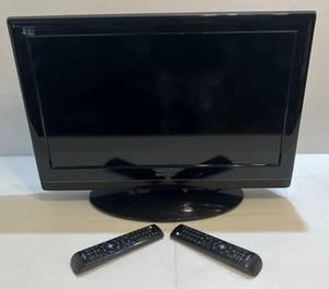 lot 105 image: 26 Insignia TV W 2 Remotes & Built In DVD Player (Works)