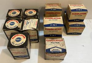 lot 325 image: Group Of Misc. Vintage Oil Filters Including Purolator PER-3, P-70FF, P-76-1 And P-76-2