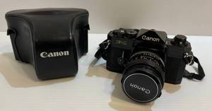 lot 199 image: Vintage Cannon F-1 Camera With Lens And Carrying Case