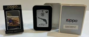 lot 203 image: Two Zippo Lighters 1 Chrome With The Right To Keep And Bear Arms 1 Model 29 .44 Magnum Both NIB