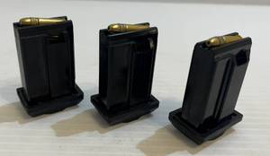 lot 278 image: 3 Remington Magazines Model No. 597 22 Long Rifle 10-Round Plastic Black (With Hollow Point Cartridges)