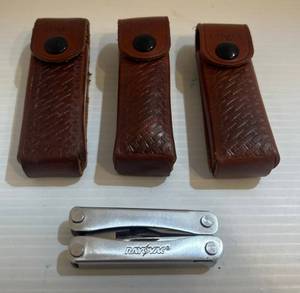 lot 297 image: Gerber Multi Tool With Extra Sheaths
