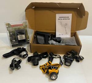 lot 318 image: Group Including Metal Detector NIB,  Headlamps And Stearns Handheld Electronics Holder NIB
