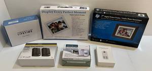 lot 320 image: Group Including Electronic Picture Frames, Wireless Security Alert System And More (All But One New In Box)