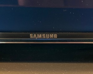 lot 49 image: Samsung 56 Inch TV with Remote