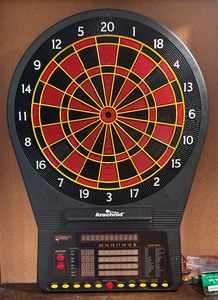 lot 33 image: Arachnid Dartboard in a Brunswick Wooden Cabinet with Darts and Tips