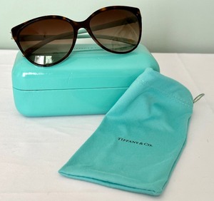 lot 8 image: Tiffany and Co Sunglasses with Case