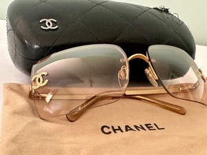 lot 30 image: Pair of Chanel Sunglasses with Case