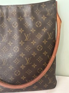 lot 12 image: Vintage Louis Vuitton Leather Monogramed Handbag
