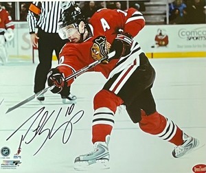 lot 292 image: Chicago Blackhawks Hockey Framed Autographed Photograph of Patrick Sharp