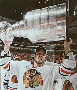 lot 294 image: Chicago Blackhawks Hockey 2010 Stanley Cup Championship Framed Photograph featuring Johnathan Toews