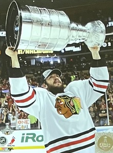 lot 297 image: Chicago Blackhawks Hockey 2013 Stanley Cup Championship Framed Photograph featuring Corrie Crawford