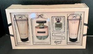 lot 323 image: New Victorias Secret Perfume, Lip Gloss, Lotion and Body Wash