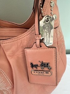lot 375 image: Pink Coach Leather Handbag with Embroidery Design and Leather Coach Wallet