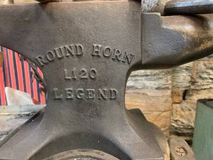 lot 4 image: L120 Legend Anvil with log mount and hand tool storage