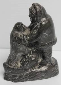 lot 61 image: AI Wolf Eskimo And Seal Vintage Soapstone Carving