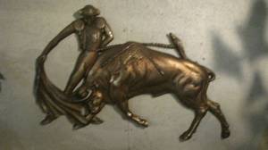 lot 62 image: Vintage Wall decor of a Madadore and Bull