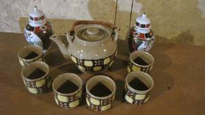 lot 71 image: Stoneware type Saki teapot and mug set