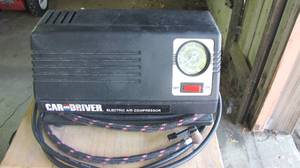 lot 97 image: Car and driver electric air compressor