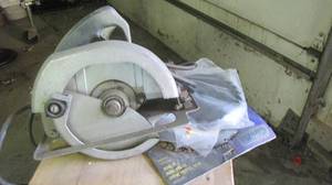 lot 106 image: Vintage Manning-Bowman electric circular saw