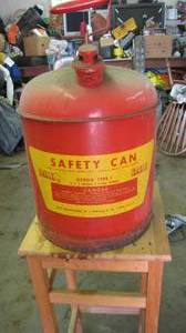 lot 121 image: Metal Eagle 4  gallon gas can