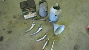 lot 129 image: Box of metal funnels, oil dispensers, more