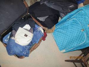 lot 218 image: (2) large suitcases filled with assortment of mens coats