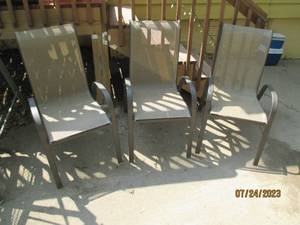 lot 15 image: 3 Metal frame patio chairs