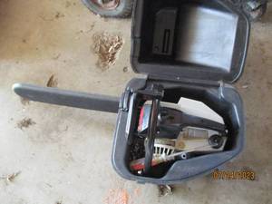 lot 19 image: Craftsman chain saw in a case.