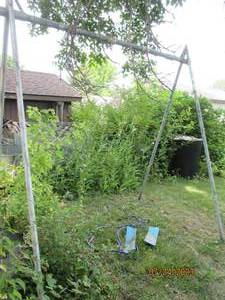 lot 234 image: Swing set frame with 2 swings