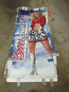 lot 95 image: Coors Light poster.
