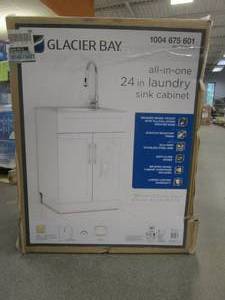 lot 25 image: Glacier Bay All-in-One Stainless Steel 24 in Laundry Sink with Faucet and Storage Cabinet in White - SCRATCH AND DENT, CRACK IN SIDE WALL BY HINGE - FOR PARTS OR RESTORE - SOLD AS IS