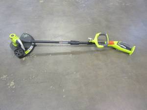 lot 92 image: RYOBI ONE 18V 13 in. Cordless Battery String TrimmerEdger - Cracked Handle, WORKS, USED, FOR PARTS.