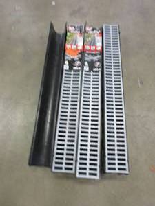 lot 154 image: RELN Storm Drain 10 ft. Channel with Portland Grey Grate Accessory - 1 MISSING COVER, 3 MISSING CONNECTORS