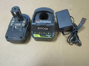 lot 238 image: RYOBI ONE 18V Lithium-Ion 1.5 Ah Battery and Charger, P189, P118B - WORK
