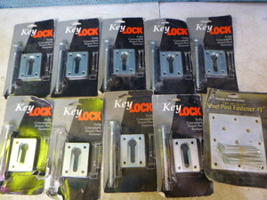 lot 28 image: 9 Key Lock Concealable Newel Post Fasteners